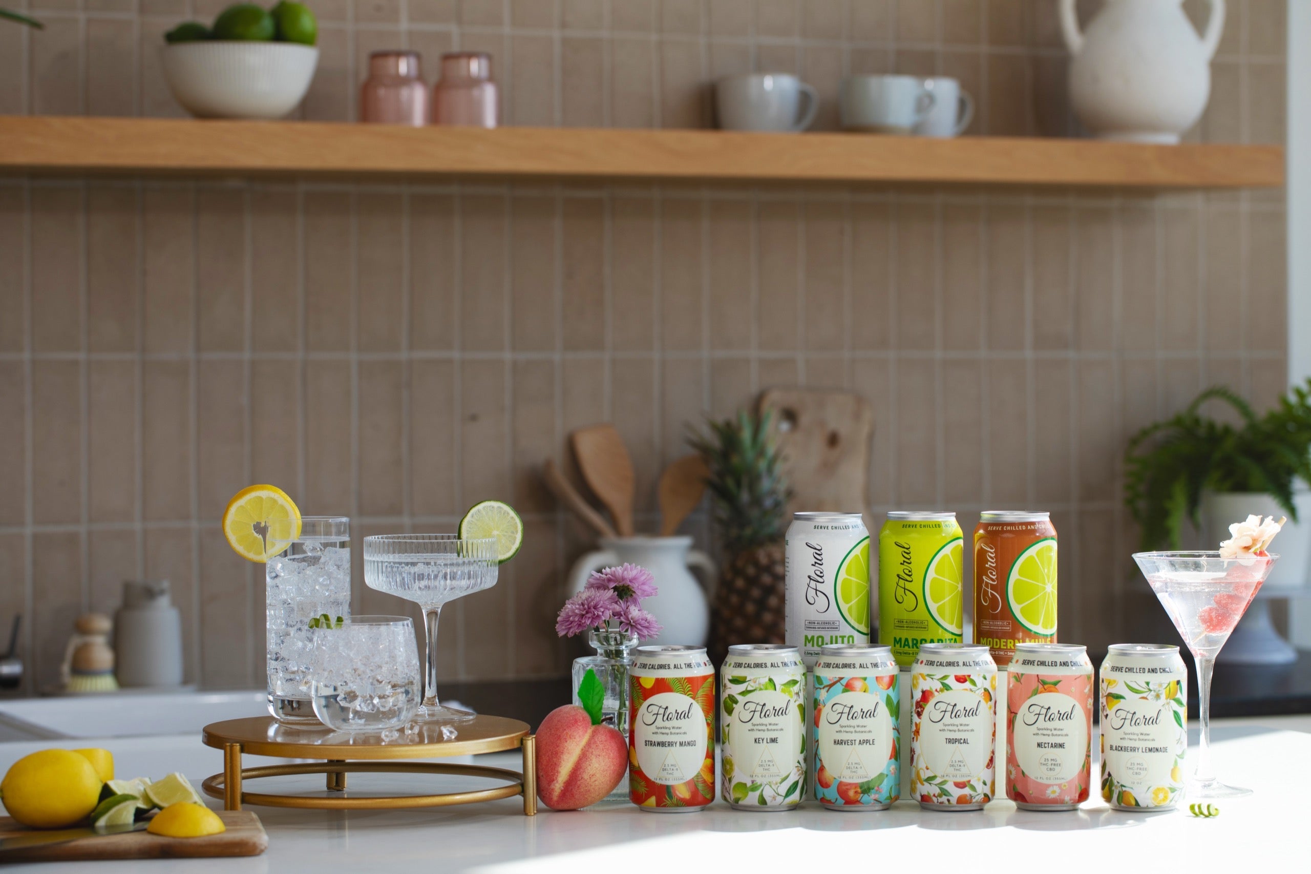 Floral THC beverages — seltzers and cocktails on a kitchen counter